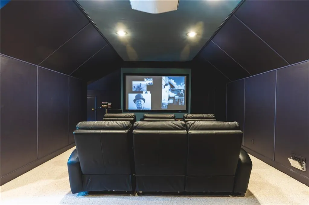 Cinema featuring carpet flooring, vaulted ceiling, and recessed lighting