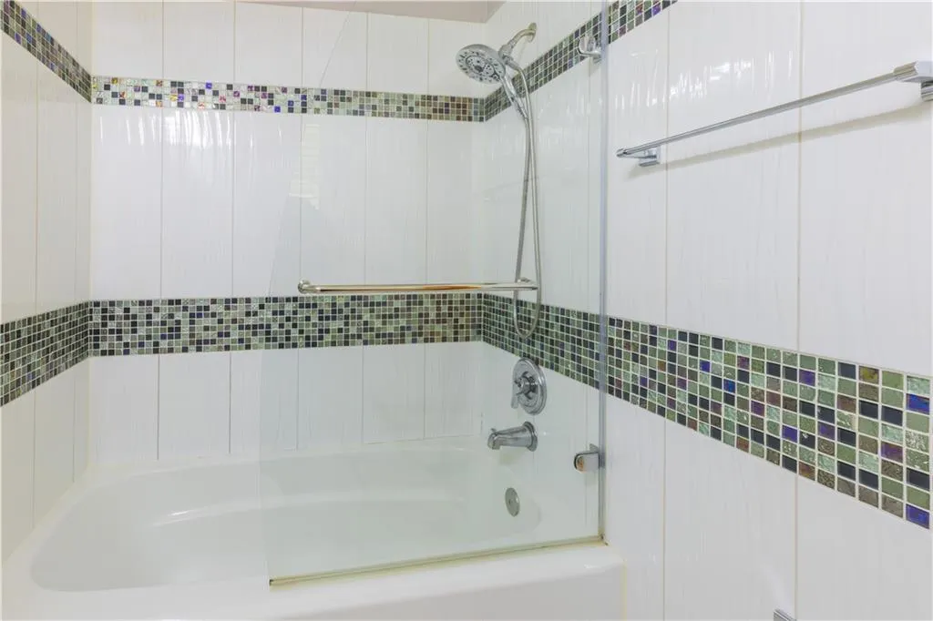 Bathroom featuring bathtub / shower combination