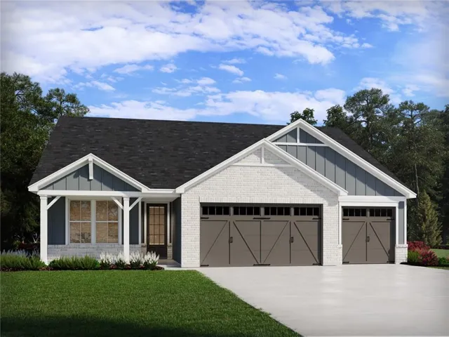 White brick exterior with blue-gray vertical siding accents