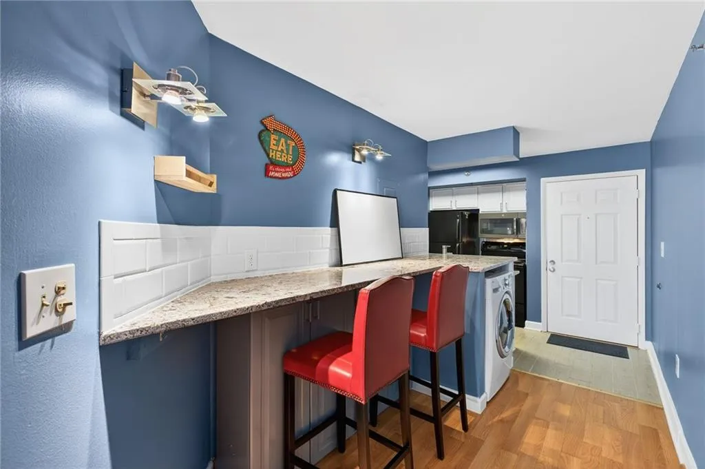 Dining area has a bar for maximizing space.