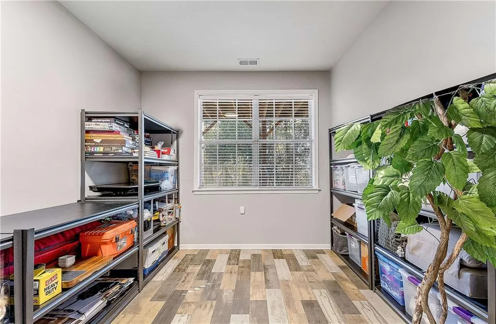 Fully Finished room - heated and cooled with area stubbed for full bath.