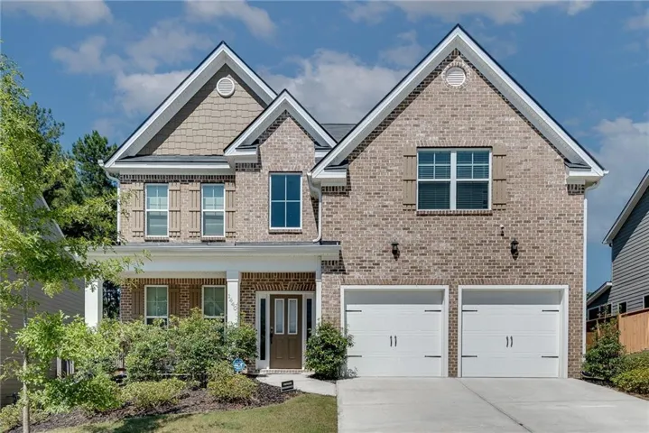 Brick exterior with shaker shingle accents