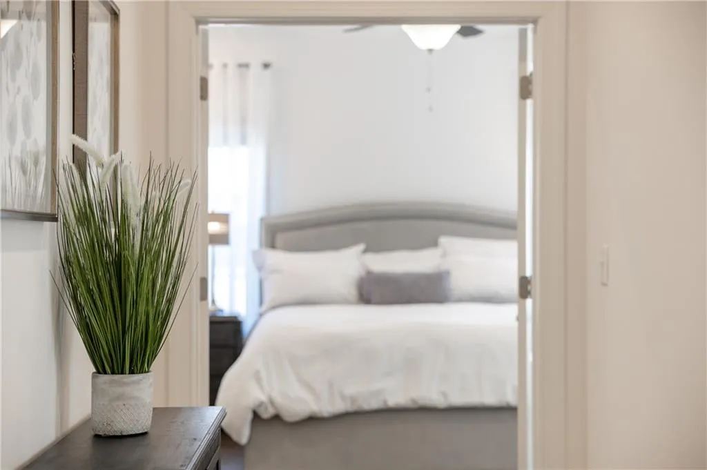 Bedroom with multiple windows