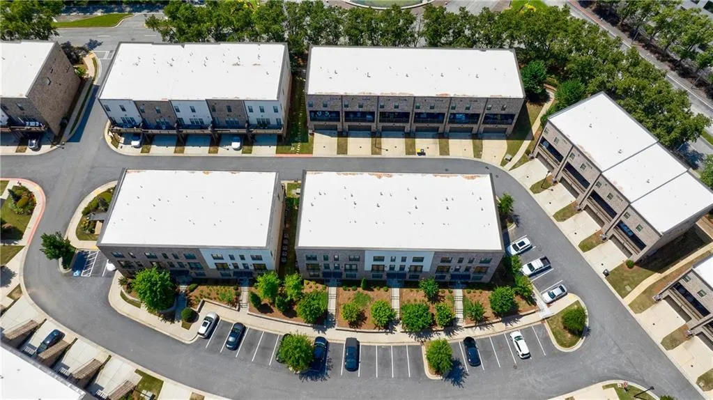 Drone / aerial view of apartment complex / building