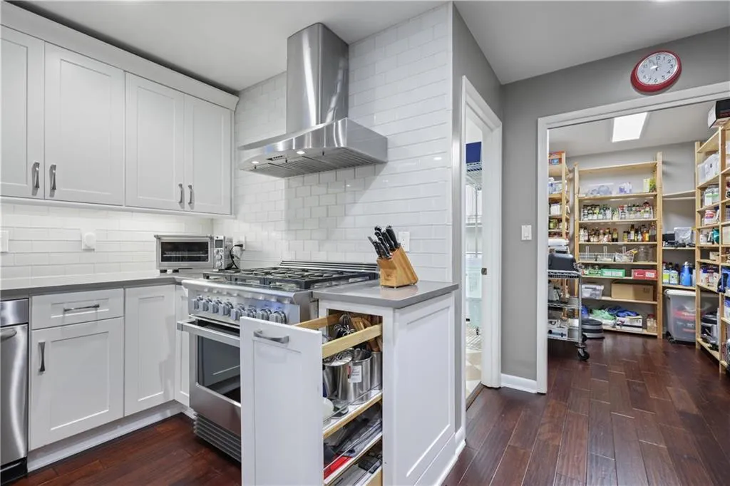 Kitchen view into HUGE pantry.