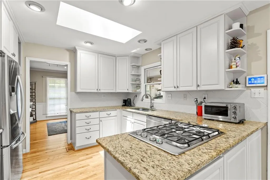 7105 Duncourtney Drive, Sandy Springs, Georgia 30328, 4 Bedrooms Bedrooms, ,3 BathroomsBathrooms,Residential,Sold,7105 Duncourtney Drive,7077952