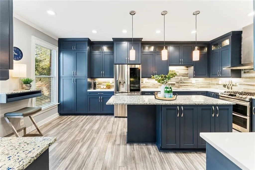 Spacious island with seating for two — perfect for casual dining or entertaining
