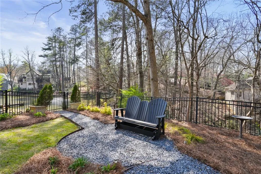 COURTYARD with stone steps leading to the private Dock