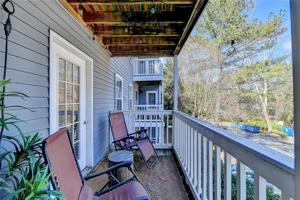 Balcony off of great room with french doors from master bedroom as well