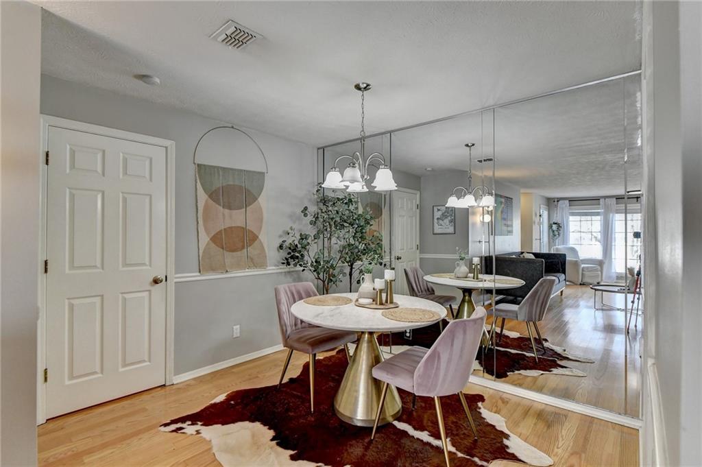 dining area with mirrored wall