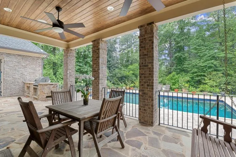 View of patio / terrace featuring ceiling fan, an outdoor kitchen, and grilling area