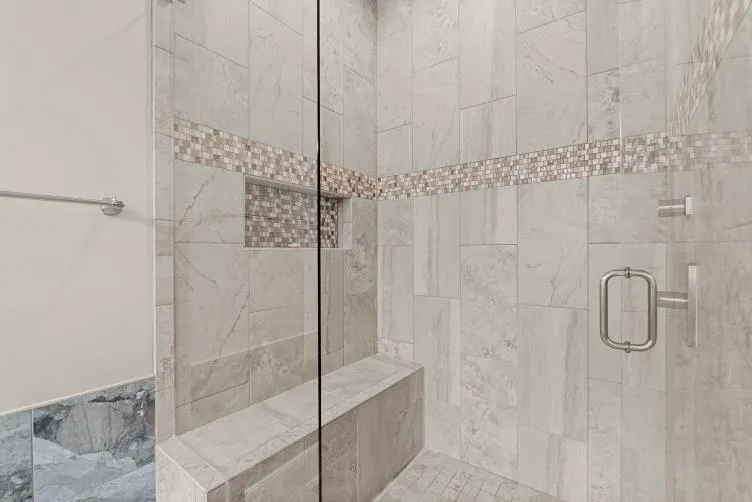 Bathroom with a shower with shower door