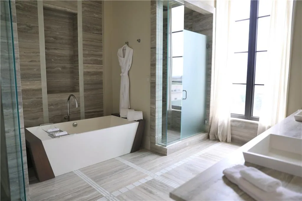 Bathroom with independent shower and bath