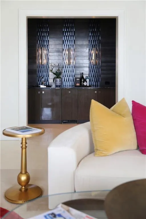 Bar featuring dark brown cabinetry