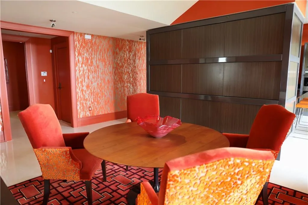 Dining area with lofted ceiling