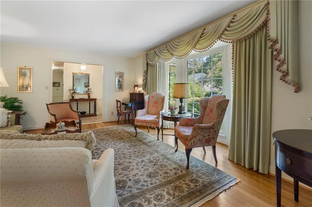 Sitting room featuring light hardwood / wood-style floors