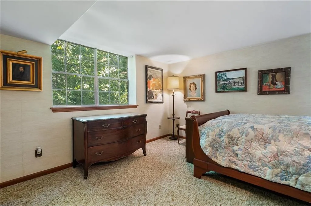 View of carpeted basement level bedroom