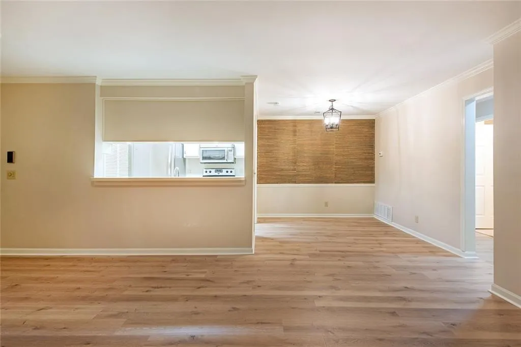 breakfast bar allows for views from kitchen into living room