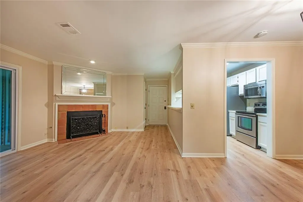 Open living space with living room, kitchen, breakfast bar and dining room