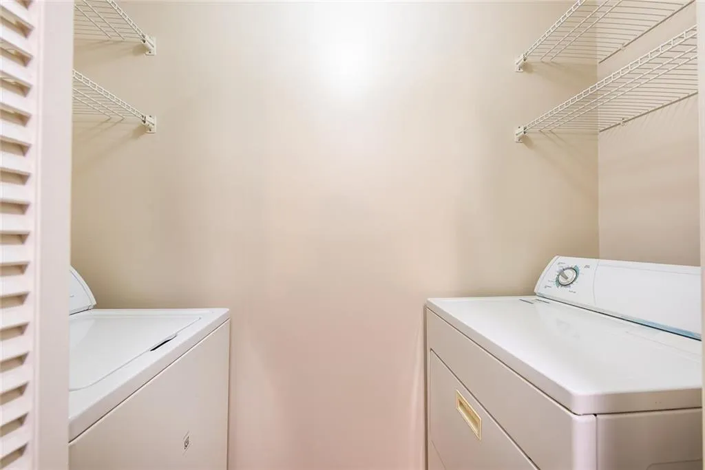 Laundry room featuring washing machine and dryer