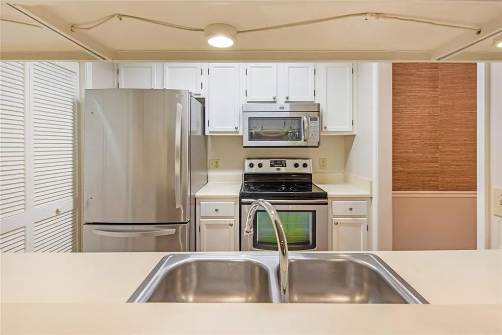 Kitchen has open view  to dining and living room