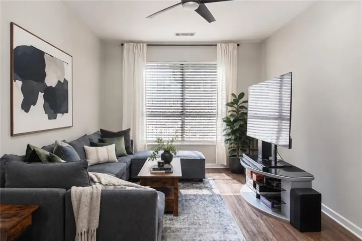 Wood-finish flooring throughout the space