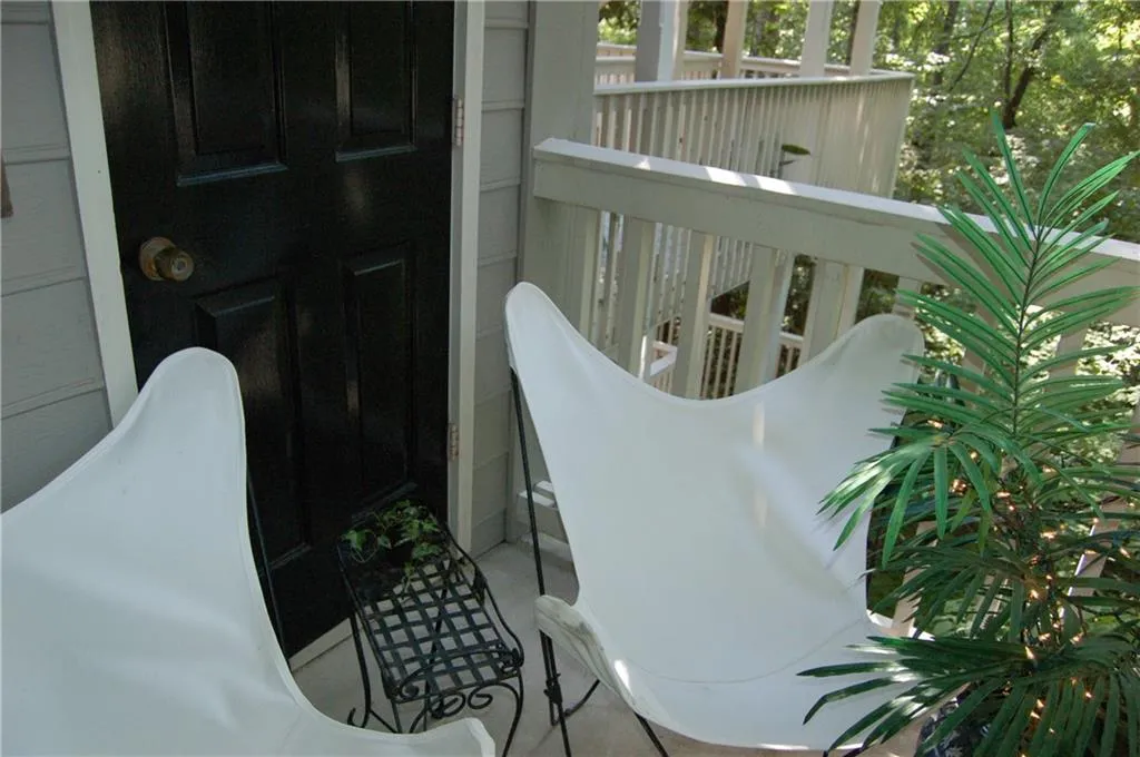 Outdoor deck with an extra closet for storage.