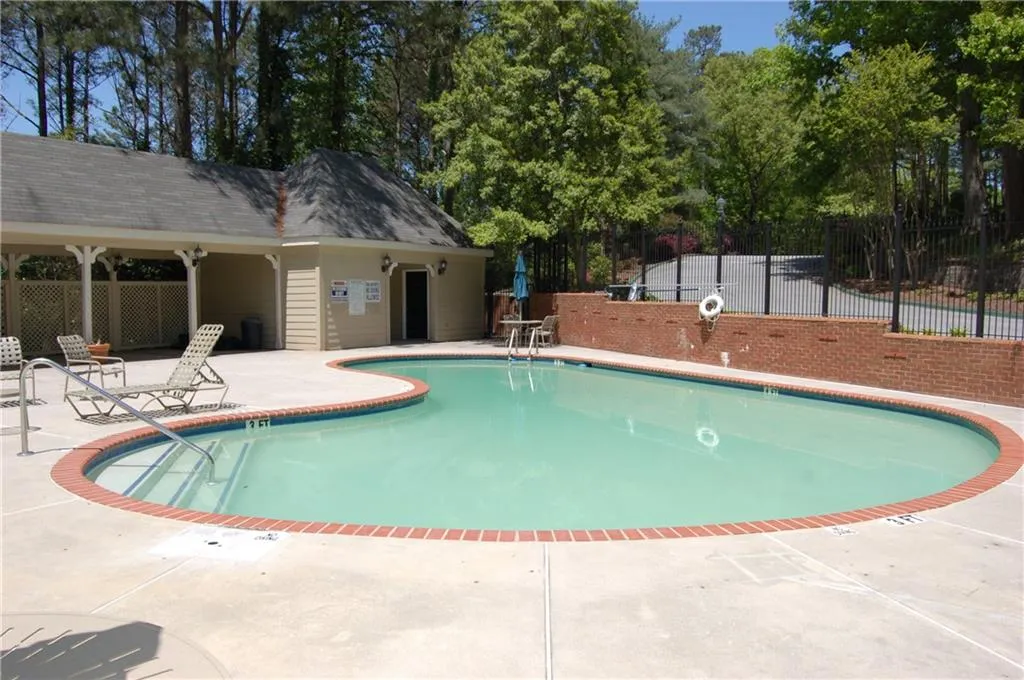 View of pool with a patio area