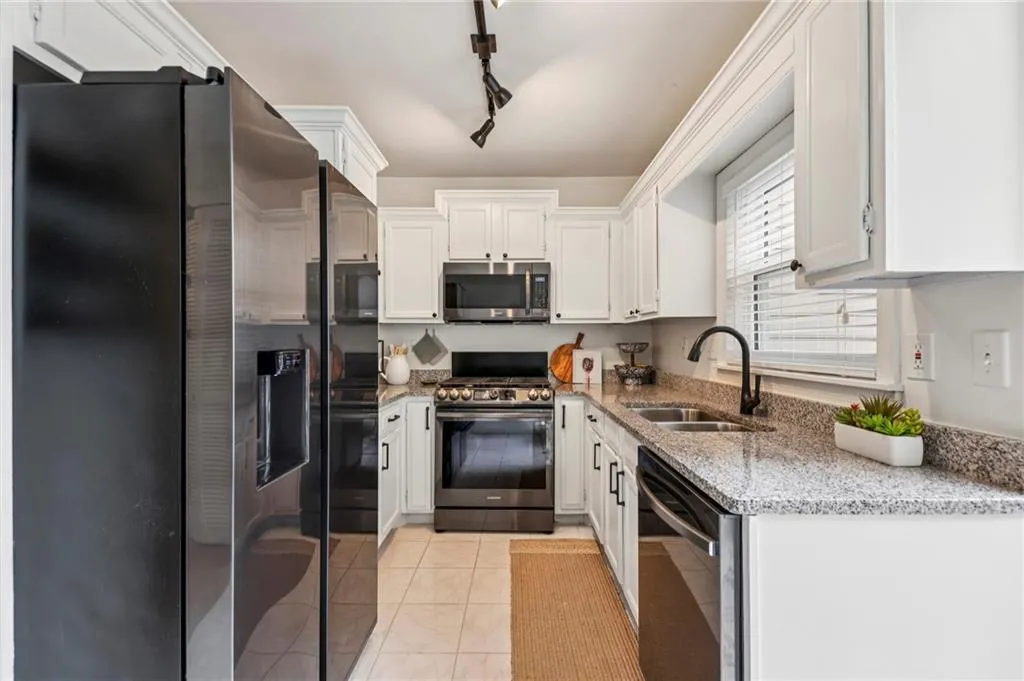 Kitchen with stainless steel appliances.