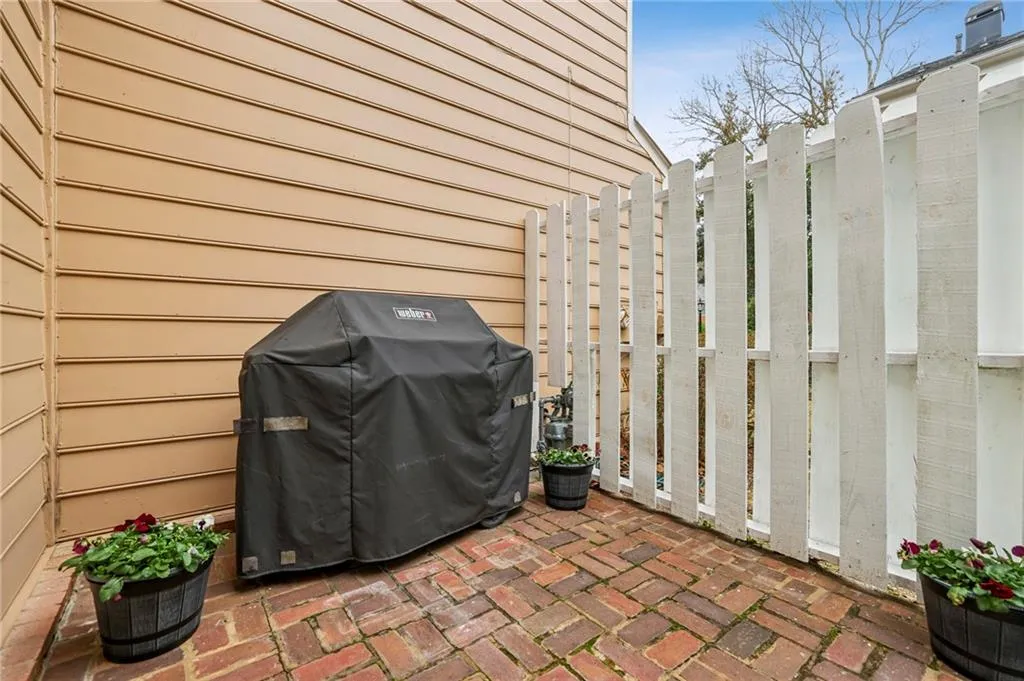 Private, level patio with pet-friendly backyard access.