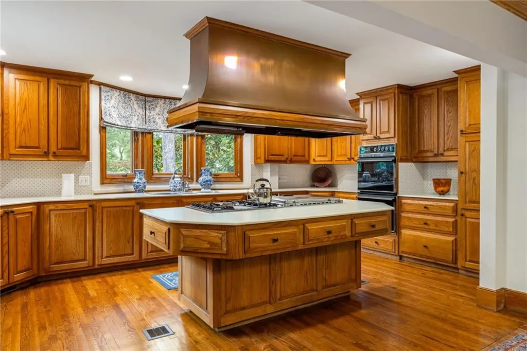Kitchen cabinets have custom lazysusans, wine racks, pullouts, etc.