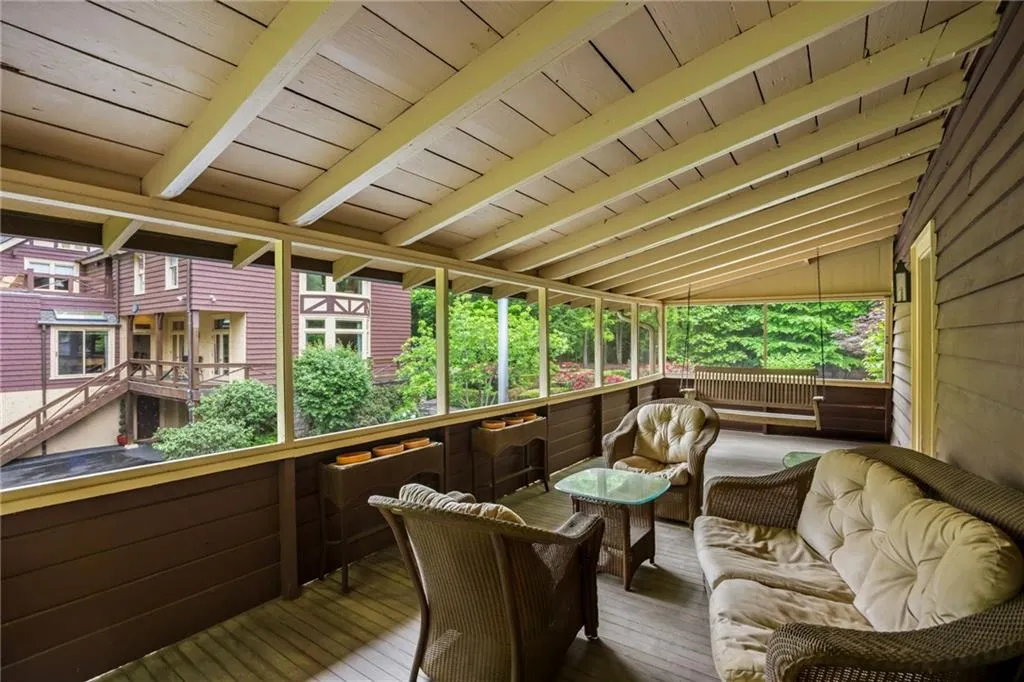 Full length screen porch of the cabin