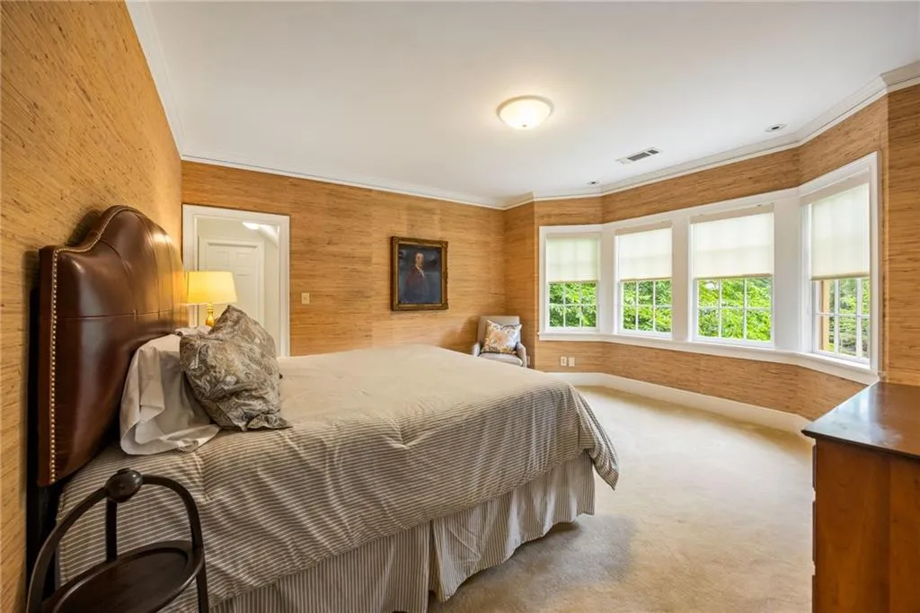 Third large guestroom with big walk in closet, gorgeous view of the front yard and direct bath access