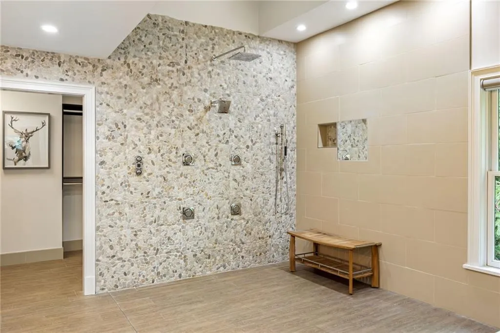 Room size shower with multi sprays, heated floors, speakers to enjoy your favorite music and a heated towel bar-you won't want to leave!