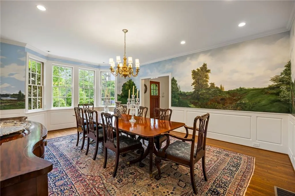 Holiday memories will be created in this banquet size dining room with a custom hand painted mural