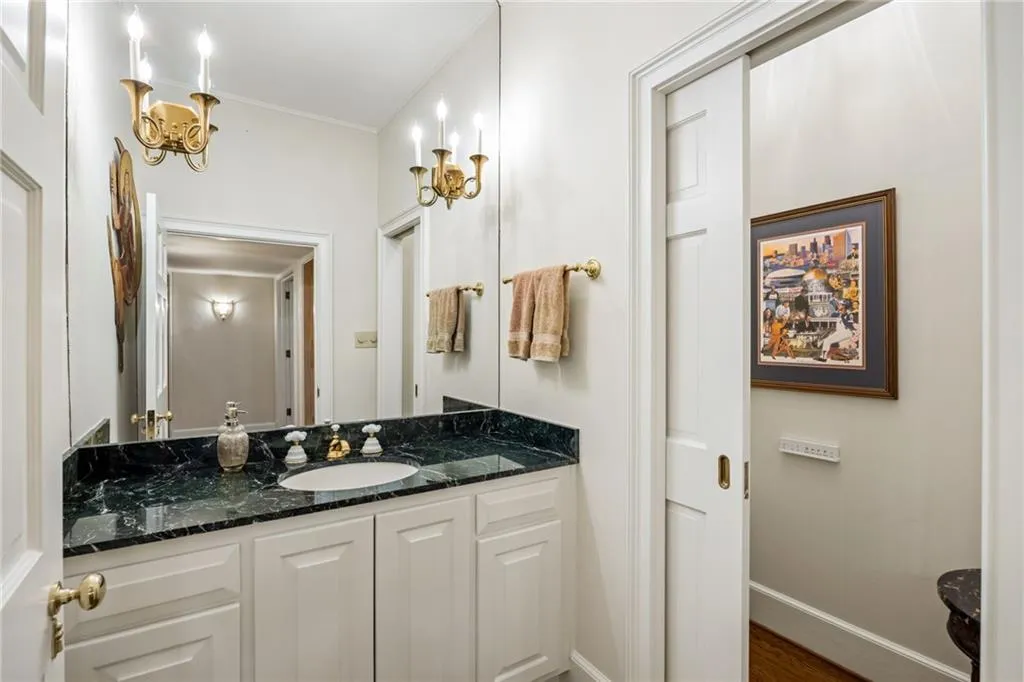 Formal powder room with Toto bidet seat. There is another powder room on the main level too for convenience.