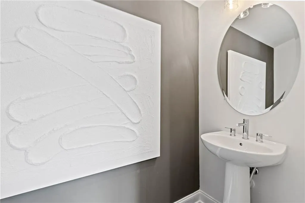 Half Bathroom on 4th floor. Picture of Model Home.