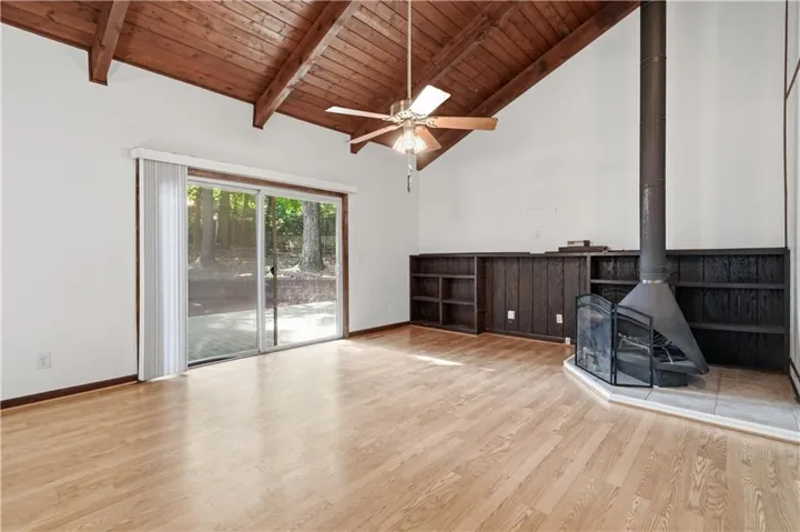 Vaulted wood-paneled ceiling with exposed beams