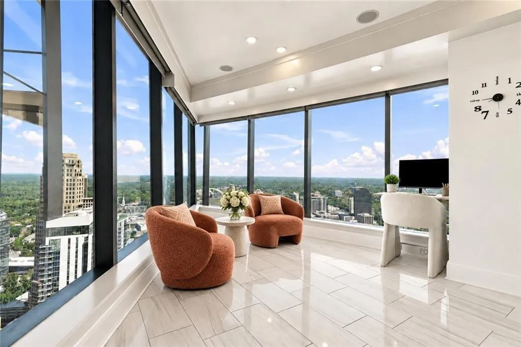 Separate sitting area with full skyline views