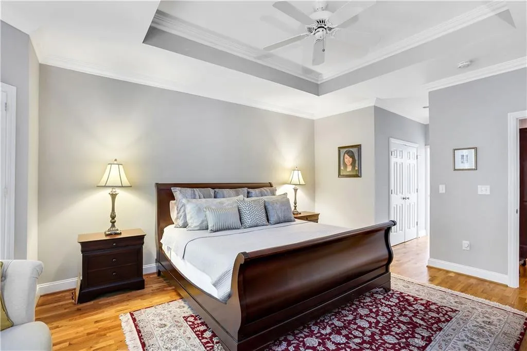 Primary bedroom has hardwood floors