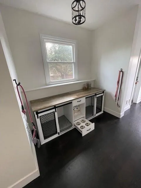 Hallway by garage. Dog crates are not built-in.