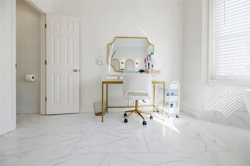 Home office with marble finish floor