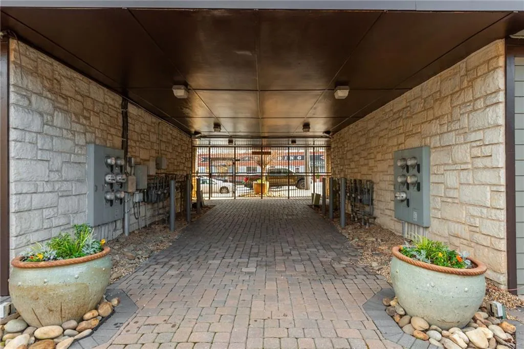 Community access to street level through gate.