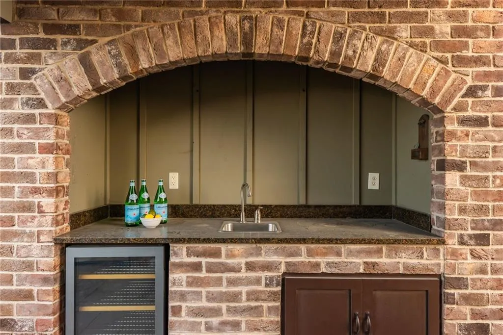 Private rooftop terrace with wet bar is perfect for entertaining guests or enjoying the sunsets and Atlanta skyline