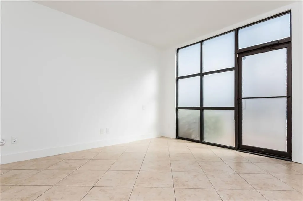 Lower level bonus room with separate commercial entrance provides the owner with the opportunity to run your business from home or makes for a great roommate plan, bonus room, home gym, etc.