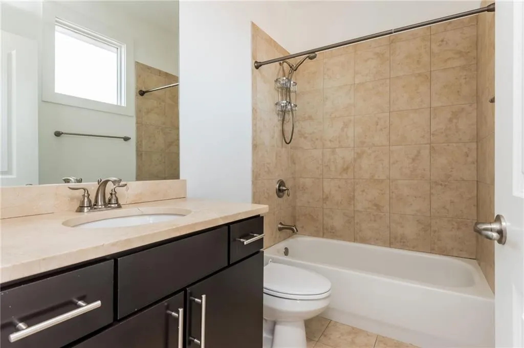 Upper level secondary en-suite bathroom