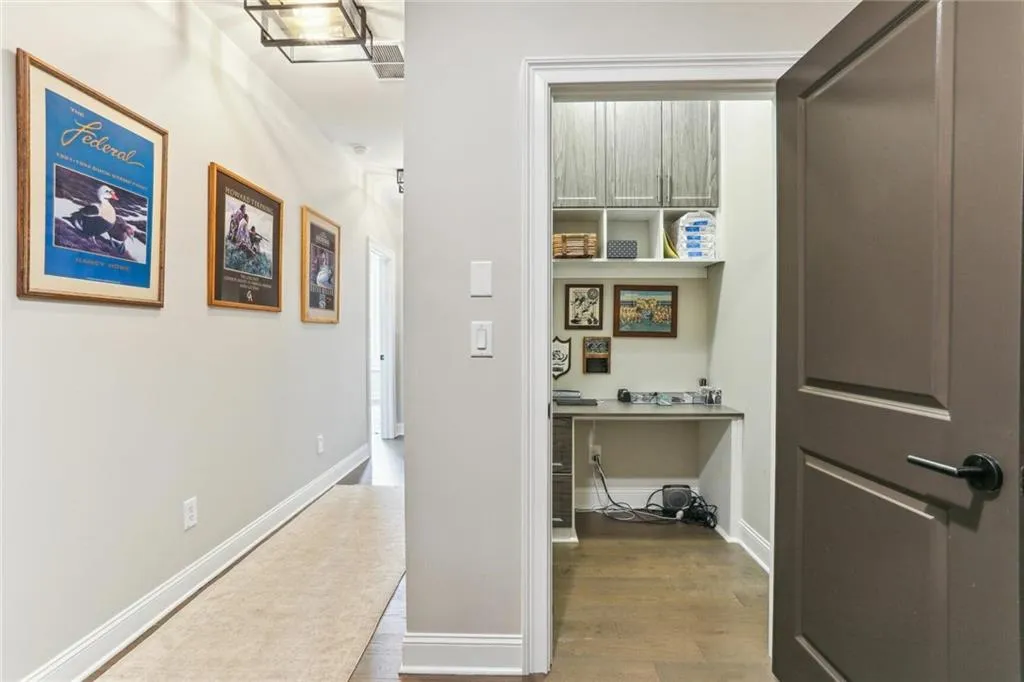 Hallway featuring hardwood / wood-style flooring