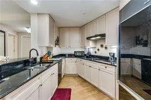 galley kitchen with all newer appliances