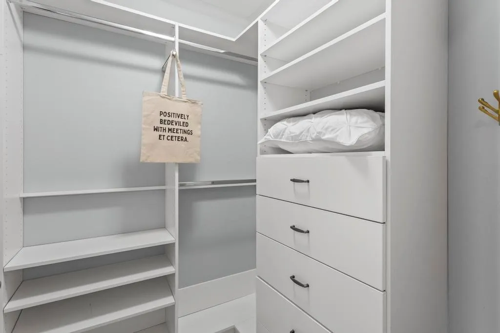 View of spacious closet with organizational system in Bedroom #1