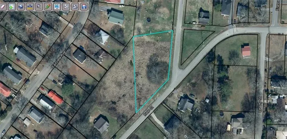Aerial map of property and surrounding area with property parcel outlined